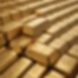 A close-up of shimmering gold bars stacked neatly, symbolizing wealth.